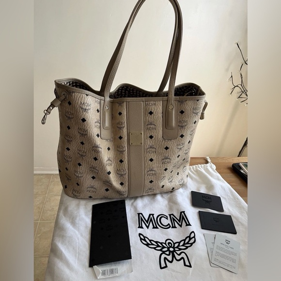 MCM Handbags - 📌SOLD📌 MCM Beige Women's Liz Shopper Visetos Medium No Zip Pouch With Dustbag